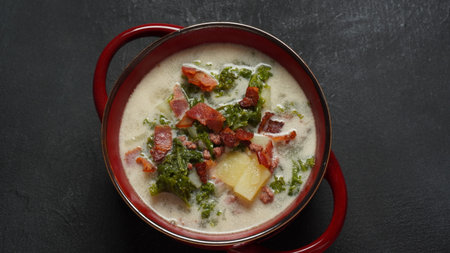 Zuppa Toscana Soup  with Italian sausage, kale, fried bacon and potatoes red pepper in a creamy...