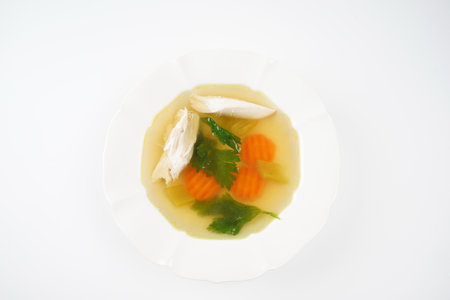 Chicken soup, chicken broth, with pieces of chicken and vegetables. Chicken bouillon, boiled meatの写真素材