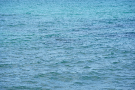 Sea water surface, wave texture. Calm seascape. The background of the blue waters of the sea. Background sea calm waterの写真素材