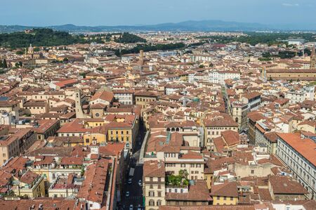 Aerial or bird eye view of Florence cityscape at a bright sunny summer day, as seen from Florence Cathedral (Santa Maria del Fiore) bell tower (Giotto Campanile).の写真素材