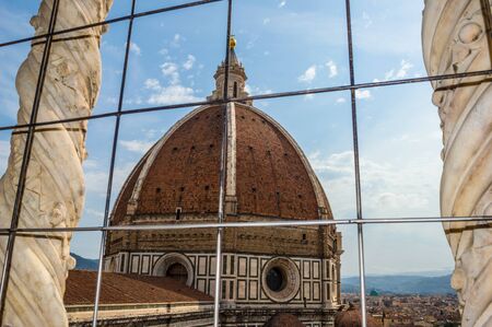The dome of Florence Cathedral (Santa Maria del Fiore Duomo) as seen from Florence Cathedral Bell Tower (Giotto Campanile)の写真素材