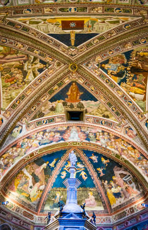 Siena, Italy - CIRCA 2013: Baptistery of Saint John (Battistero di San Giovanni) ceiling interior in Siena Cathedral complex.のeditorial素材