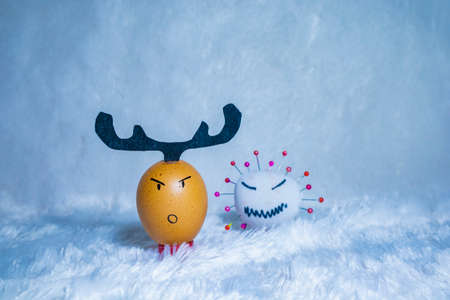 Cute painted egg to celebrate Christmas in times of covid pandemic. Fun indoor activity with kids.