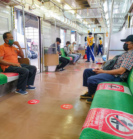 Tangerang, Indonesia - CIRCA Dec 2020: Typical situation inside public transport in Indonesia during...