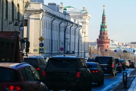 Moscow Kremlin Tower and the flow of cars in Moscowの写真素材