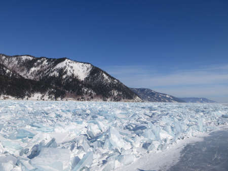 Colorful ice in winter on Lake Baikal in Februaryの写真素材