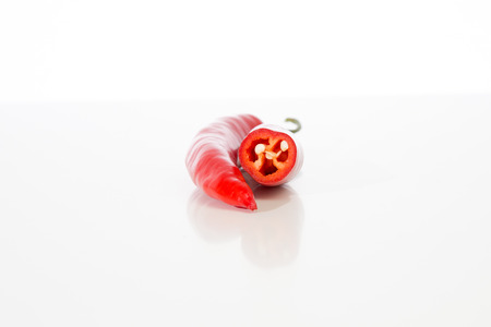 Isolated Chili on white tableの写真素材
