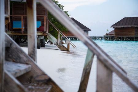 Stairs lead to water on the Maldivesの写真素材
