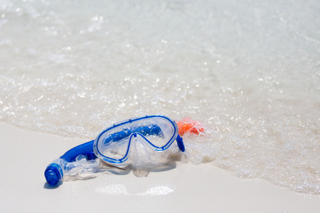 diver diving goggles in the sandの写真素材