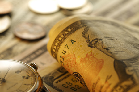 Time is money.  Gold Tone. Close upの写真素材