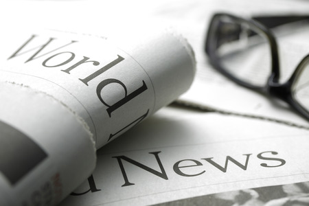 Glasses on newspaper,shot with very shallow depth of field.の写真素材