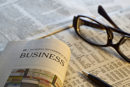 Glasses on newspaper,shot with very shallow depth of field.の写真素材