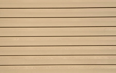 Texture of wooden walls painted in yellow colorの写真素材