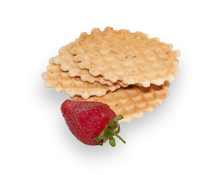 Several waffles and ripe strawberries isolated on white backgroundの写真素材