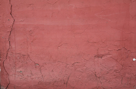 Texture of old wall covered pink stucco reliefの写真素材