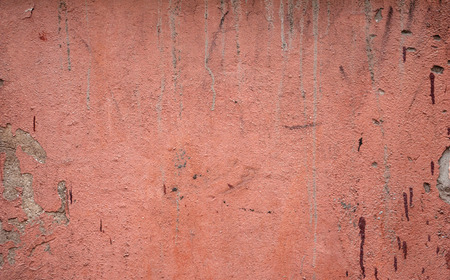 Texture of old rustic wall covered with brown stuccoの写真素材