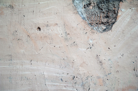 Texture of old rustic wall covered with gray stucco