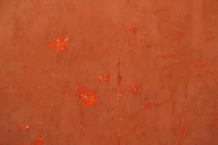 Texture of old rustic wall covered with brown stucco