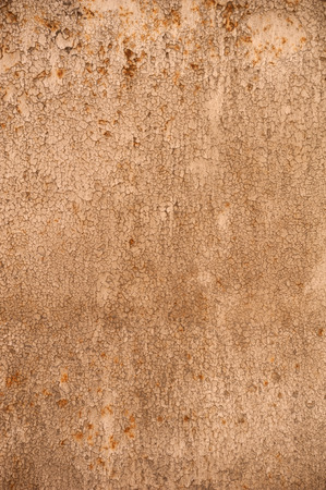 Texture of old rustic wall covered with brown stuccoの写真素材