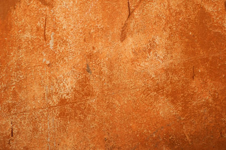 Texture of old rustic wall covered with brown stuccoの写真素材