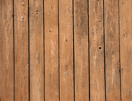 Texture of old rough red fenceの写真素材