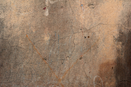 Texture of old rustic wall covered with brown stuccoの写真素材