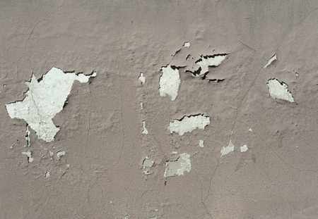 Texture of old rustic wall covered with gray stucco