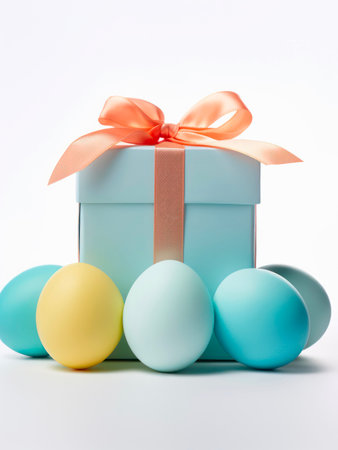 Colored easter eggs and gift box on white background.の素材