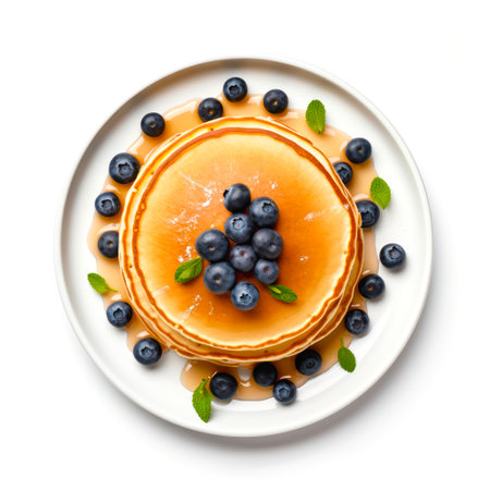 Top view of pancakes with blueberries on white background.の写真素材