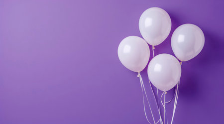 Minimal greeting banner design with bunch of white balloons on purple background with copy space for text.の写真素材