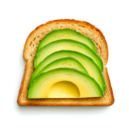 Toast with slices of avocado isolated on white background, top view.の素材