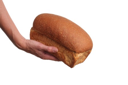 Handing out a loaf of bread. Charity concept.の写真素材
