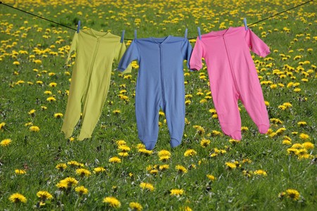 Baby sleepers on the clothesline. の写真素材