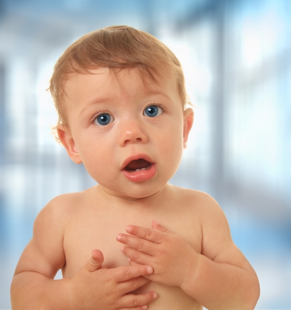 Adorable ten month old baby boy talking. の写真素材