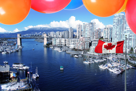 Balloons and the Canadian flag in front of the city of  Vancouver, for Canada's 150 Birthday...