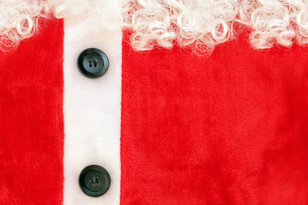 Santa Claus jacket with buttons and beard. Room for text. の写真素材