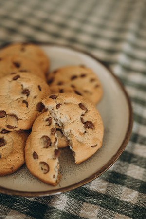 Chocolate chip cookies on a plate. Selective focus. Toned.の写真素材