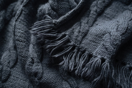 Black knitted fabric as a background, closeup. Toned.の写真素材
