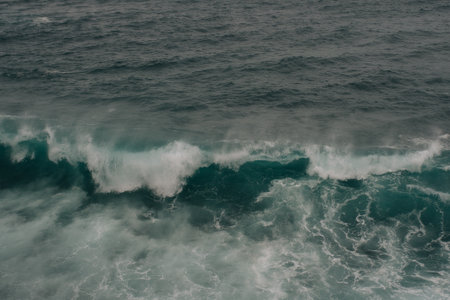 Tropical ocean wave on the surface of the sea. View from above.
