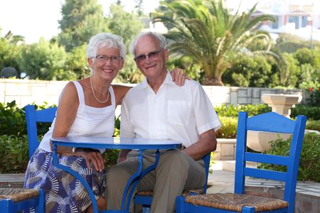 beautiful senior couple relaxing outdoors on a sunny dayの写真素材
