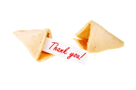 THANK YOU! - backlit single fortune cookie over whiteの写真素材