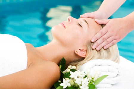 Beautiful young woman getting a spa treatmentの写真素材