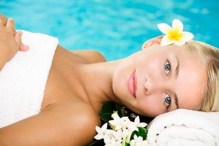 Beautiful young woman in spaの写真素材