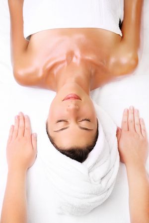 Beautiful young woman ready for massage.の写真素材
