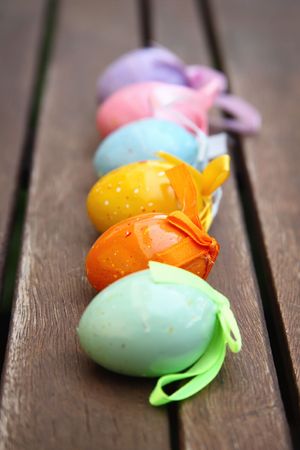 Easter Eggs In A Row. Shallow DoF with focus on orange egg.の写真素材