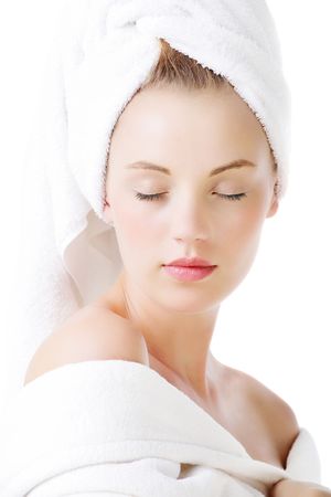 Relaxation - beautiful young woman isolated on white background. の写真素材