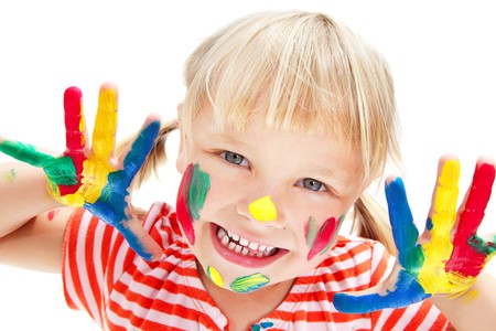 Cute little girl with painted hands. Isolated on white.の写真素材