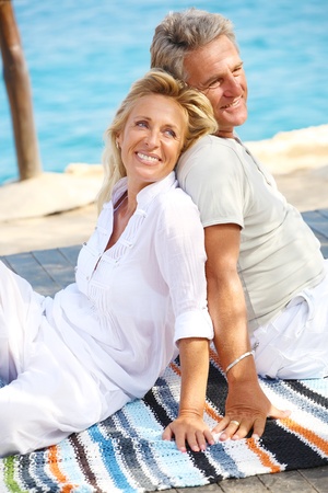 Happy mature couple outdoorsの写真素材