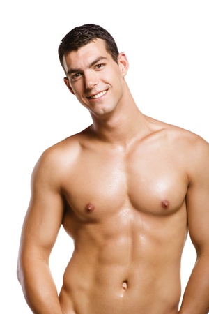 Healthy muscular young man. Isolated on white background.の写真素材