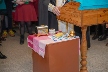 Father's tumba in church during ceremony babtistの写真素材